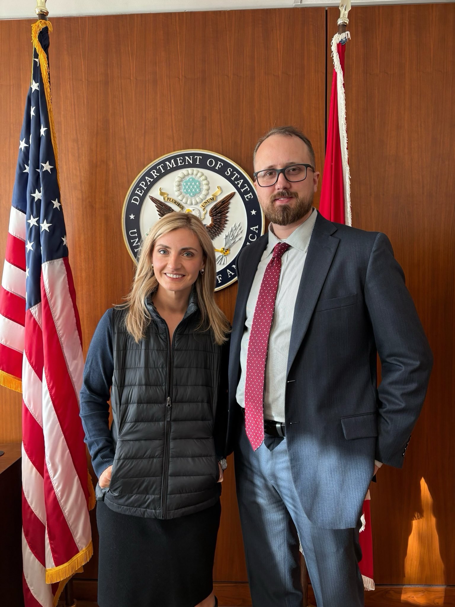 Doug Mackey with Under Secretary of State Sarah Rogers at the U.S. Department of State